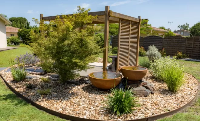 Après travaux - Pergola en bois et fontaine